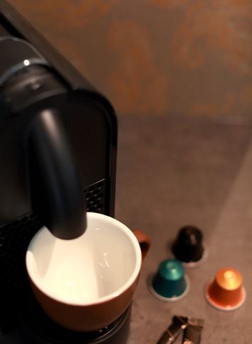 Kongesuite detalbilde av kaffemaskin
