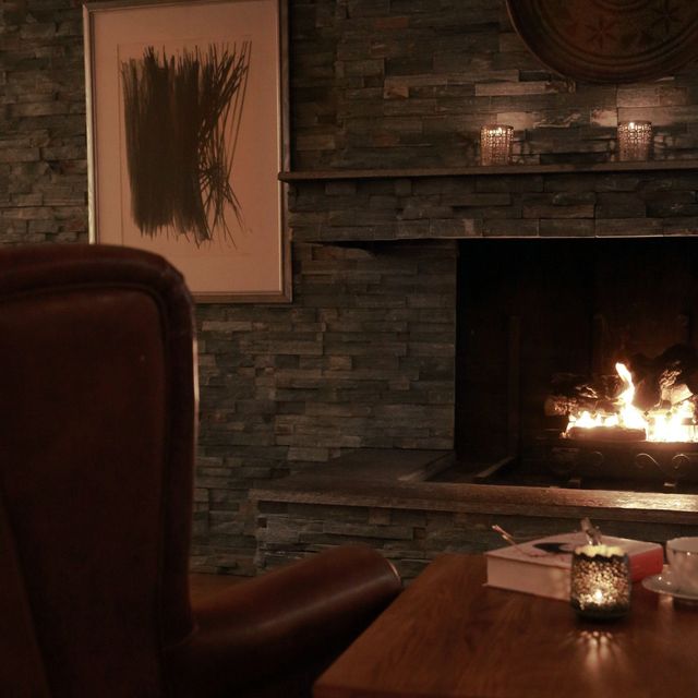 Chair by fireplace