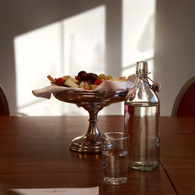 Fruit platter and water on conference table