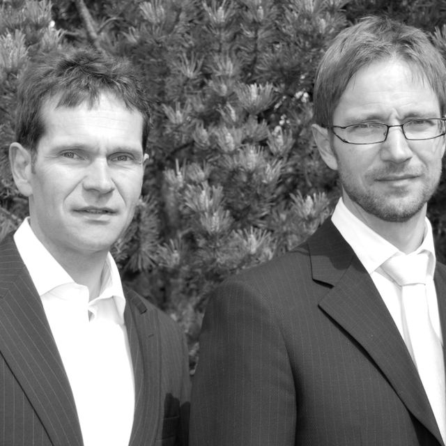 Black and white photo of two men